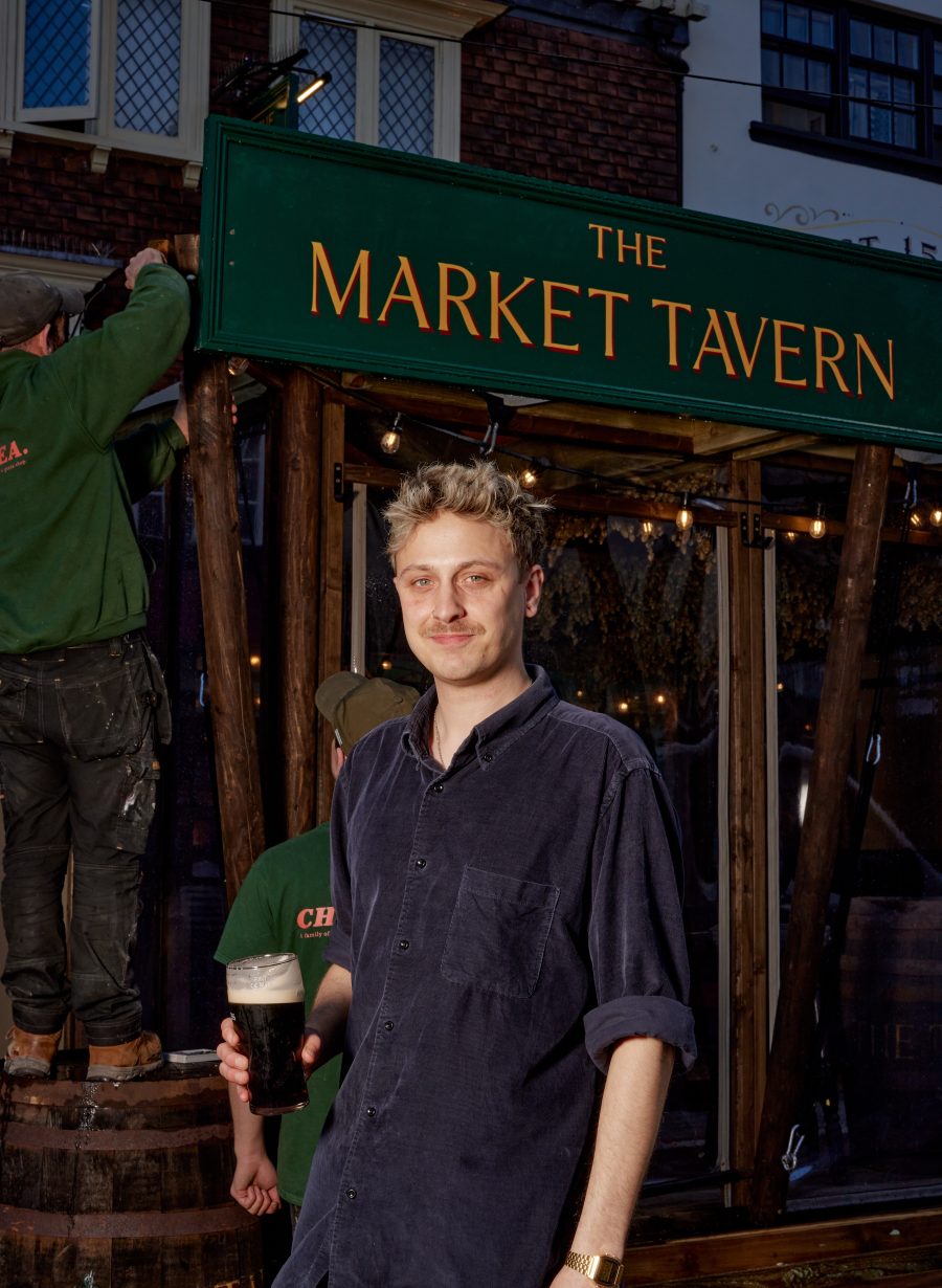 team member standing outside the pub